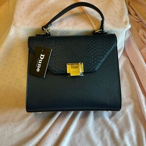 Dune purse never used, navy and cream